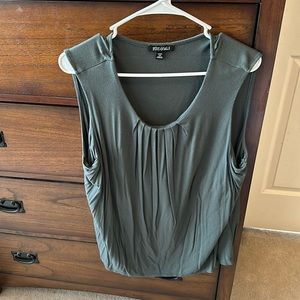Green sleeveless blouse
